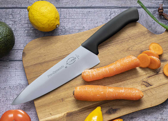 FDick Pro Dynamic chef knife on a wood cutting board